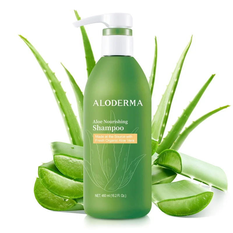 Aloe Nourishing Shampoo pump bottle surrounded by aloe leaves